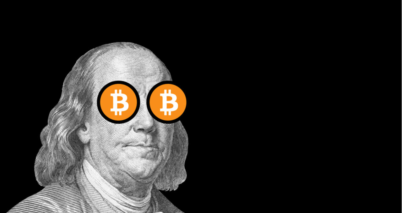 Na imagem, o estadunidense Benjamin Franklin aparece em preto e branco com seu olhos cobertos por Bitcoins